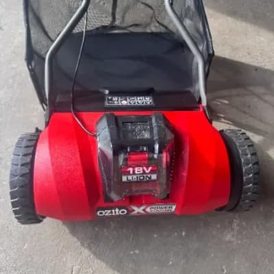 Ozito 18V cordless lawn scarifier with battery and charger